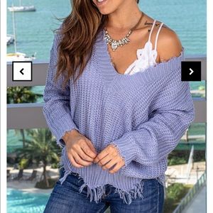 Blue v-neck frayed sweater
